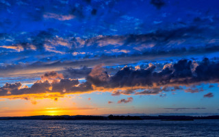 Sunset water clouds boat city 2 - colorful cloud free wallpaper