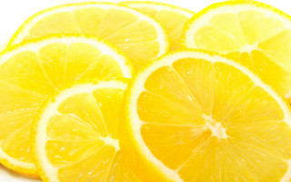 Lemon closeup water drops slice - lemon free wallpaper