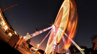 Ferris wheel night lights cityscape - a ferris wheel free wallpaper