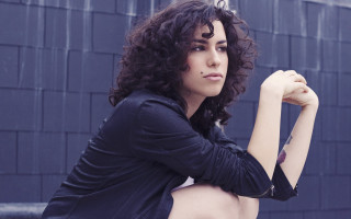 Woman curly hair rooftop fence - ayshia taşkın free wallpaper