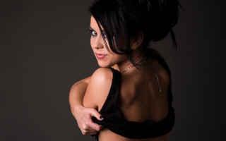 Woman black top necklace portrait - her neck free wallpaper for desktop