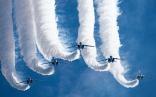 Four airplanes formation smoke jet - behind them free wallpaper