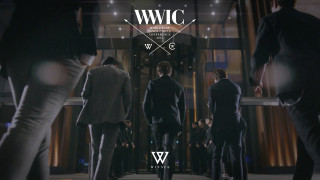 Men suits hallway wwc logo - the wall behind them free wallpaper
