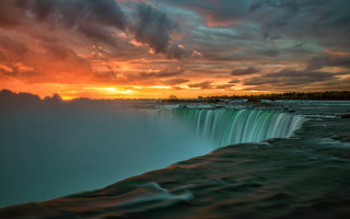 Waterfall sunset clouds lake cityscape - a waterfall free wallpaper for desktop