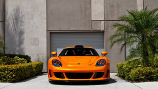 Orange sports car palm trees 3 - a orange sports car free wallpaper