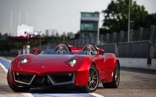 Red sports car race track 43 - front view free wallpaper