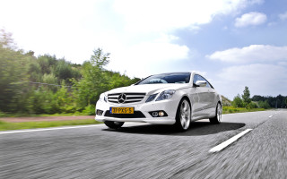 White car forest road sunny 2 - a white car free wallpaper