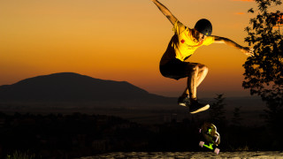Man jumping skateboard watching autumn - a skateboard free wallpaper