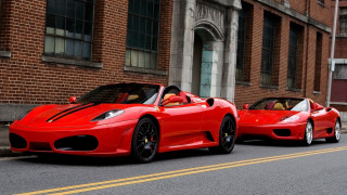 Red sports cars city road - vibrant color free wallpaper