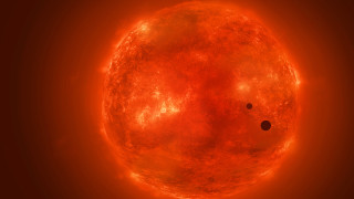 Bright orange sun black dots - orange sun free wallpaper