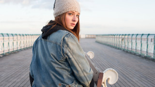 Woman denim jacket skateboard ocean - a skateboard free wallpaper