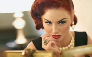 Redhaired woman mirror fashion photorealistic - a gold frame free wallpaper