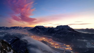 City mountain sunset clouds fire - a view of a city free wallpaper