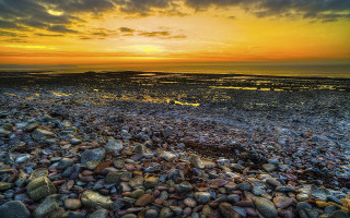 Bascove beach rocks water cloudy 3 - rock and water under a cloudy sky free wallpaper
