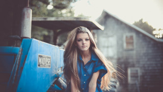 Woman leaning blue truck barn - a blue door free wallpaper