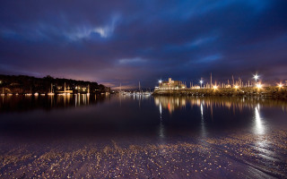 City lights night water mountains - moody free wallpaper