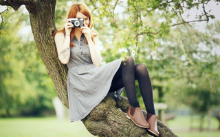 Woman sitting tree branch camera - arabella rankin free wallpaper