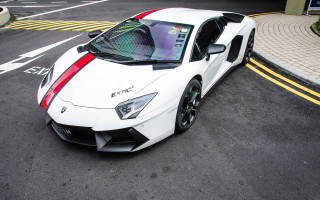 White sports car red stripe 15 - the side of the road in a parking lot free wallpaper