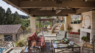 Patio couch chairs fireplace staircase - a patio free wallpaper