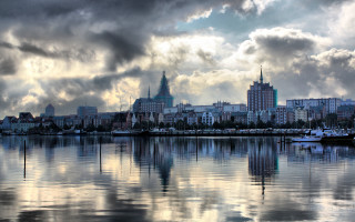 Cityscape waterreflection boat bridge skyline - tall building and a body of water free wallpaper