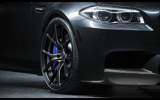 Car wheel rim closeup photorealism - a black car free wallpaper for desktop