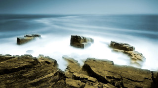 Rocky shore waves island mountains - a few wave free wallpaper