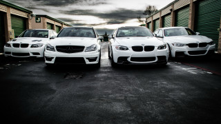 Three white cars parking lot - door free wallpaper