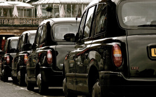 Parked cars city street clock - a city street next free wallpaper