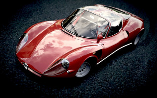 Red sports car pavement dark - realistic free wallpaper