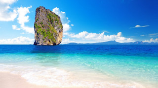 Rock ocean beach clouds sky - the ocean next free wallpaper