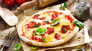 Pizza tomatoes basil wooden table 3 - a wooden spoon free wallpaper