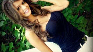 Woman black dress wind leaves - long dark hair free wallpaper