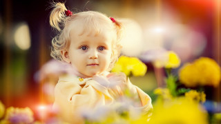 Little girl flowers portrait bokeh - her eye wide open free wallpaper