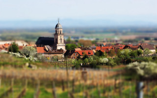 Small town church tower bokeh - ernst free wallpaper for desktop