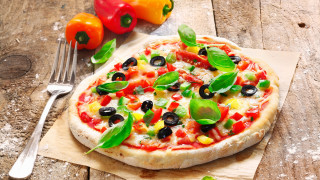Pizza olives peppers wooden table - a fork and knife free wallpaper