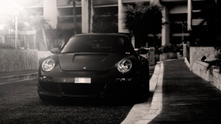 Black sports car city street 3 - a planter free wallpaper