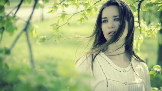 Woman tree blowing hair nature - under a tree free wallpaper