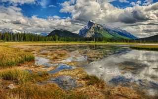 Mountain range lake forest clouds - a lake in the foreground and a forest in the background free wallpaper