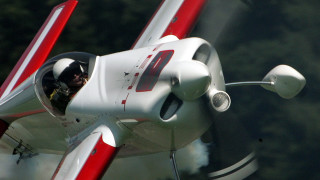 Small white airplane pilot smoke - window free wallpaper