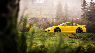 Yellow sports car foggy field - the foggy day free wallpaper
