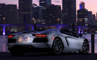 White sports car city skyline 5 - a white sports car free wallpaper