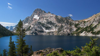 Mountain lake trees sky clouds - a lake in the foreground free wallpaper
