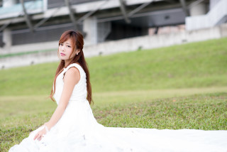 Woman white dress grass field - a building free wallpaper