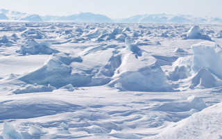 Snow mountains blue sky coastal - ice free wallpaper