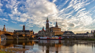 River bridge building cloudy sky 3 - a large building in the background free wallpaper for desktop