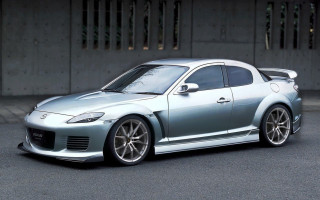 Silver sports car building parking - photoreal free wallpaper