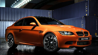 Bright orange car blue garage - matte finish free wallpaper