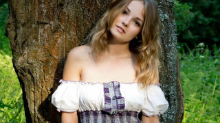 Woman dress leaning tree field - bettina heinenayech free wallpaper