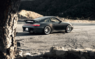 Black sports car dirt road 4 - a dirt road next free wallpaper