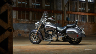 Motorcycle parked garage building windows - dan scott free wallpaper